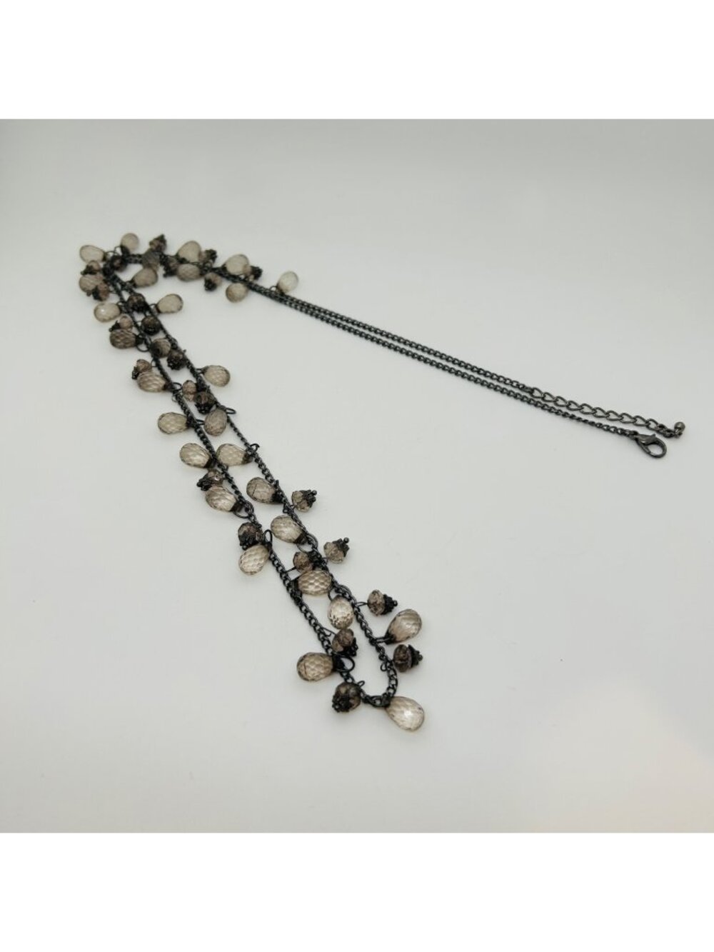 Gunmetal Multi Strand Necklace With Smoked Gray Faceted Acrylic Teardrop Beads
